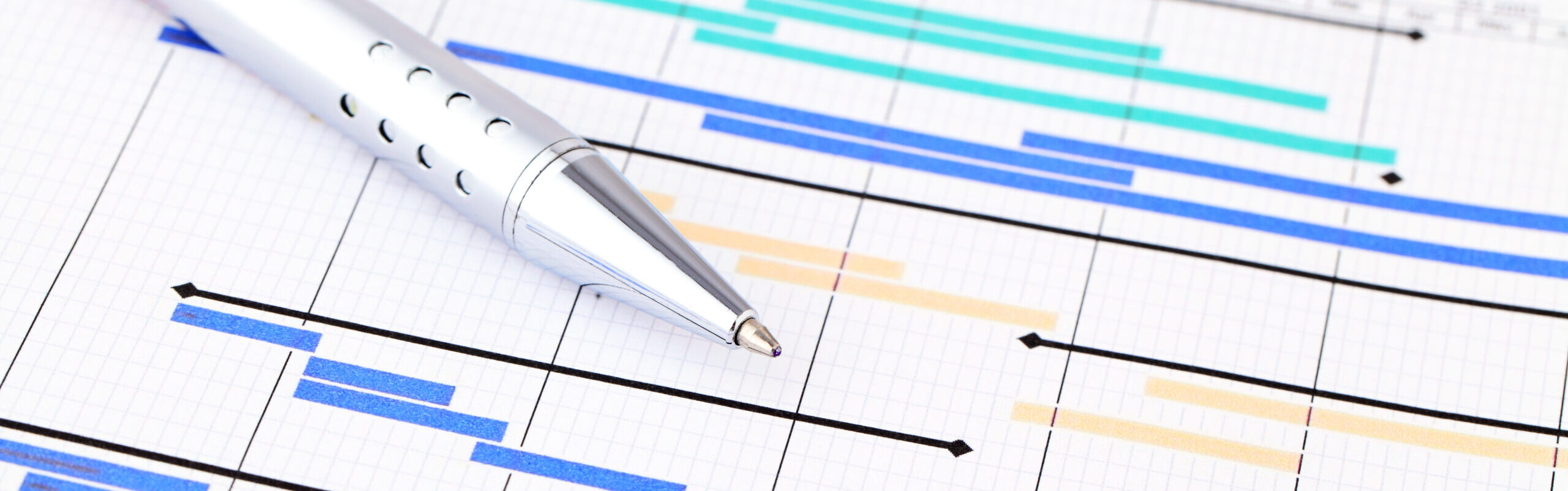 general timeline with a pen laid on top.